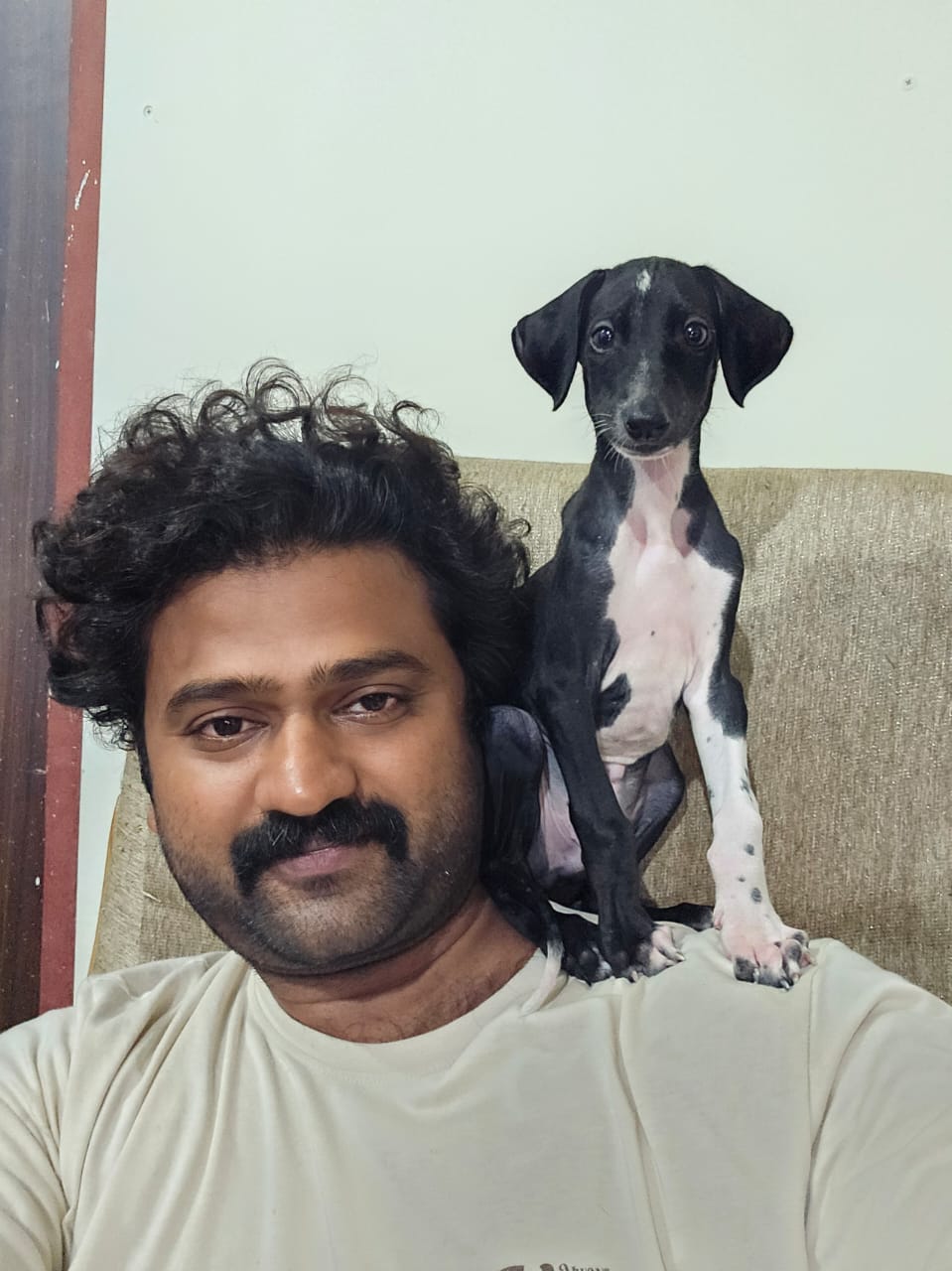 Mrs. Neha Sharma with her dog Cookie